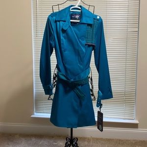 Stylish Green with Envy turquoise trench coat.